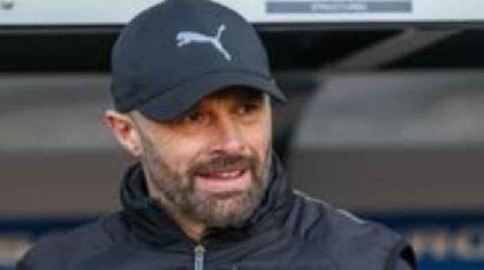 MK Dons appoint Warne as new manager