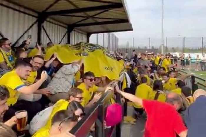 Yellow army of 100 Spaniards surprise fans at non-league game in Leicestershire