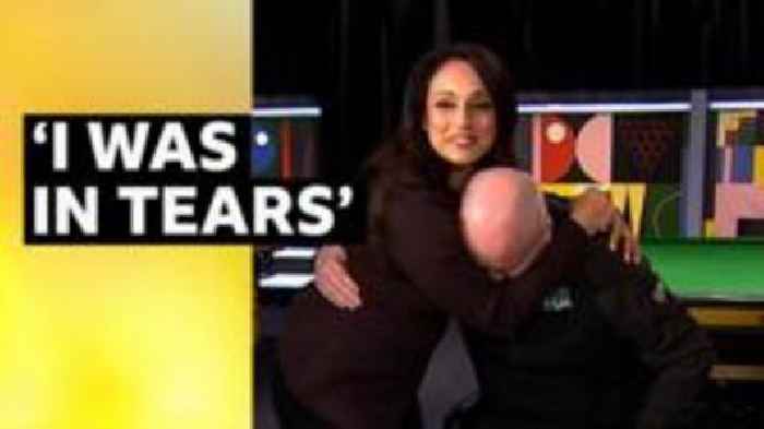 Emotional Higgins hugged by BBC presenter after match