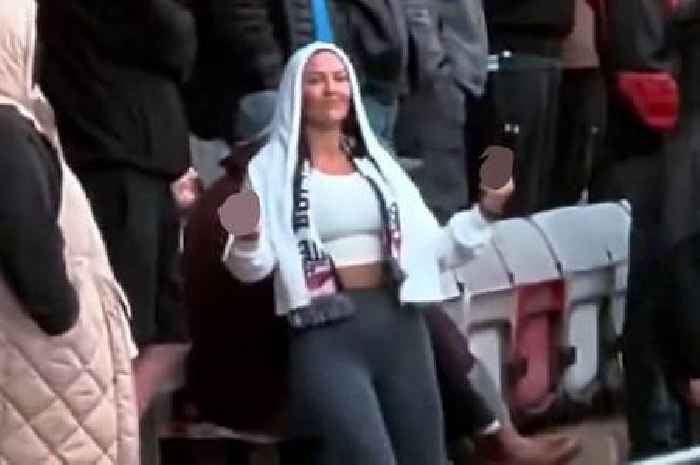 Female football fan lifts up top and gives rivals eyeful after 'slapper' taunts