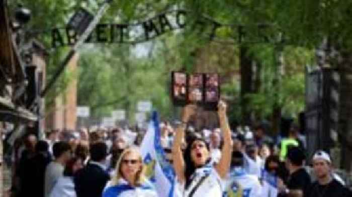 Thousands march through Auschwitz commemorating liberation