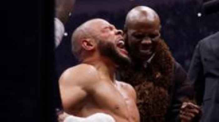 Eubank outpoints bitter rival Benn in emotional fight