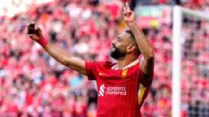 Liverpool thrash Spurs to seal title at Anfield