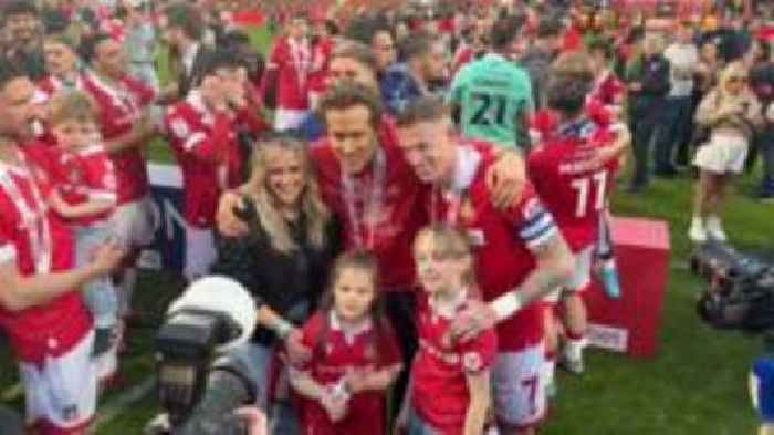 Ryan Reynolds and Wrexham players celebrate promotion