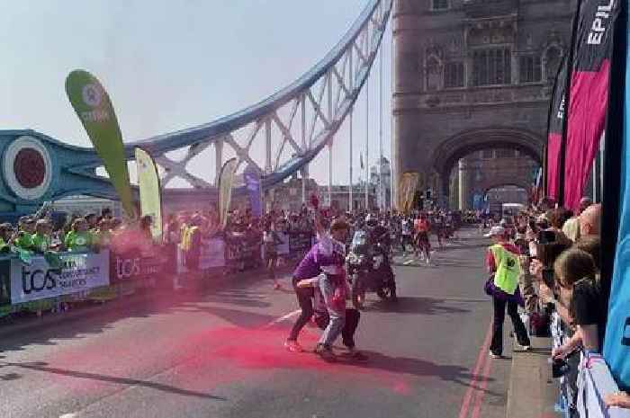 London Marathon men's elite race disrupted by protest as police tackle two people on Tower Bridge