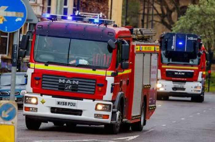 Block of flats evacuated after car fire threatens to endanger lives