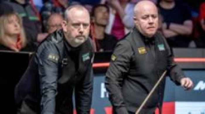 Higgins holds quarter-final lead over Williams