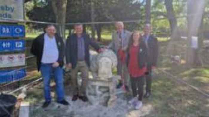 Damaged stone lion sculpture gets facelift