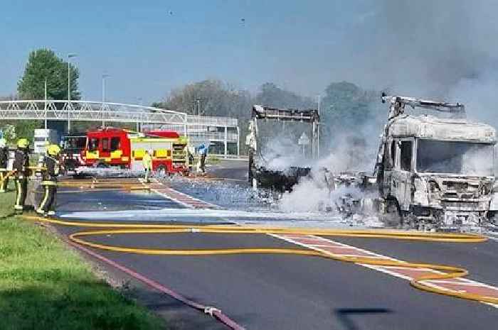 Picture shows destroyed lorry as major road remains closed after fire
