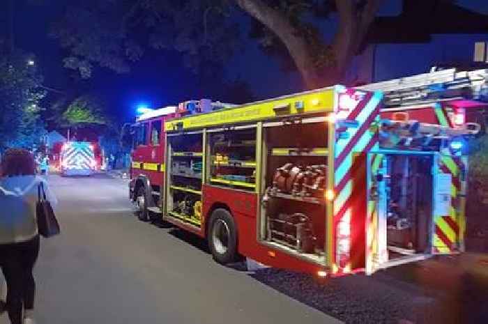 Firefighters battle 12-hour inferno of burning wood
