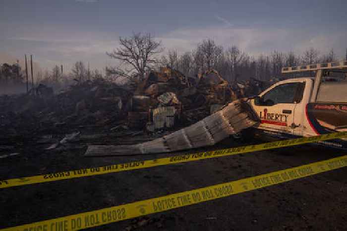 Second teen arrested in still-burning Jersey Shore wildfire