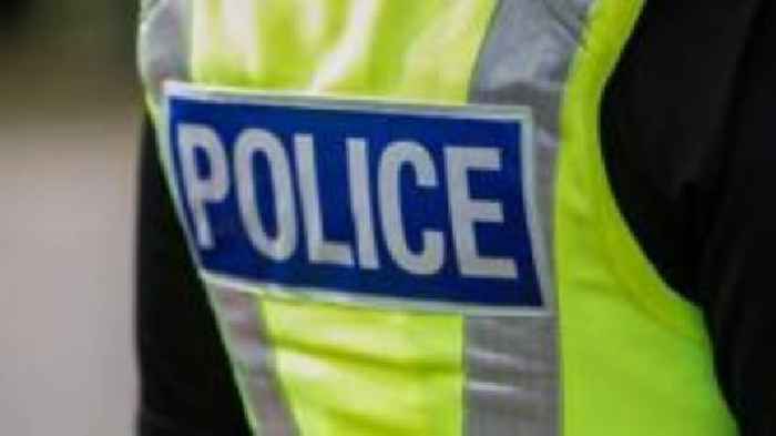 Man arrested after woman found dead in property