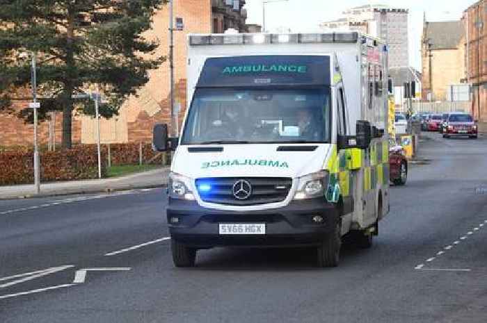 Driver, 81, treated at scene after car crashes into burn in East Kilbride