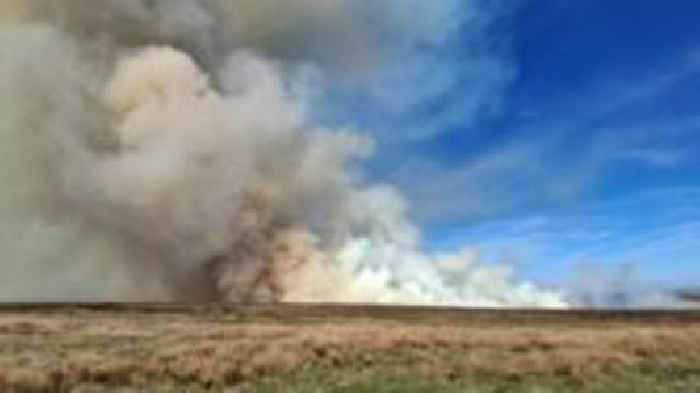 Warning as areas of moorland wildfire reignite