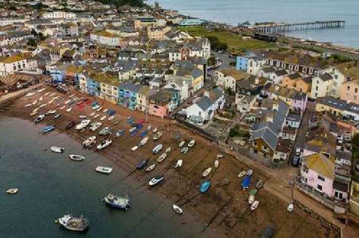 Man arrested after boy attacked by four men with weapons on UK beach
