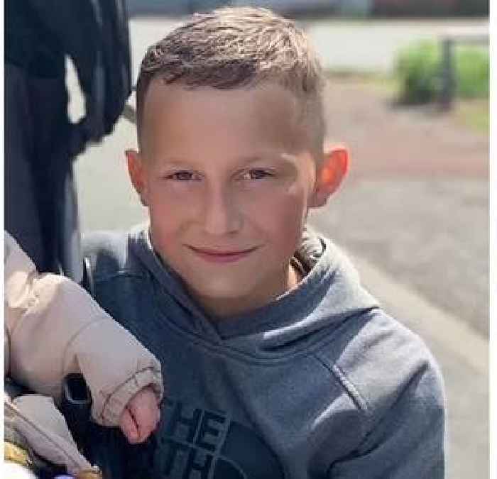 Pictured: Boy killed in industrial estate fire - 14 children arrested
