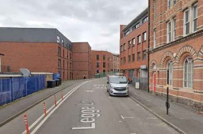 Men wearing crash helmets in Jewellery Quarter raid