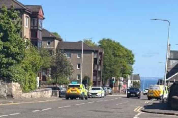Police cordon off Kirkcaldy street after woman found seriously injured