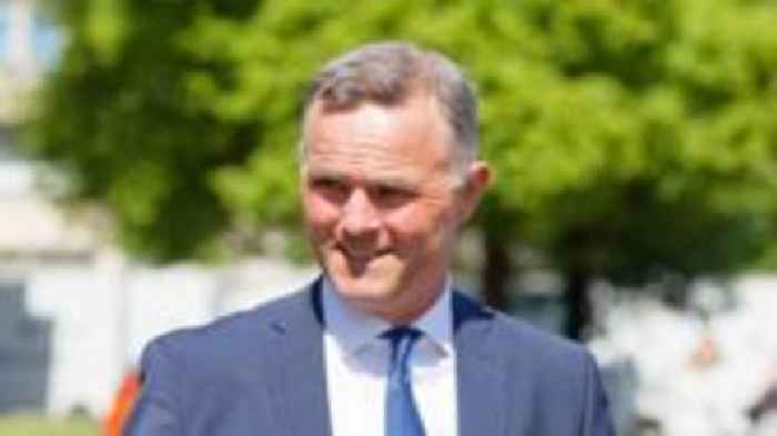 Grand National horse trainer denies assaulting man