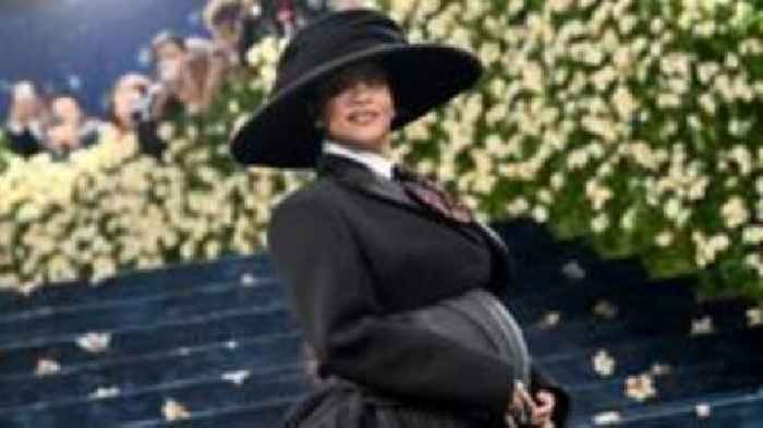 Rihanna reveals she is pregnant with third child at Met Gala