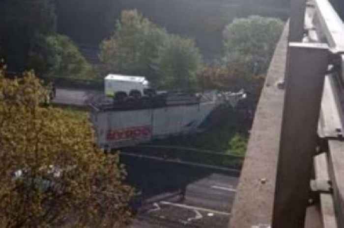 Lorry falls from M90 bridge and lands on motorway below in major incident