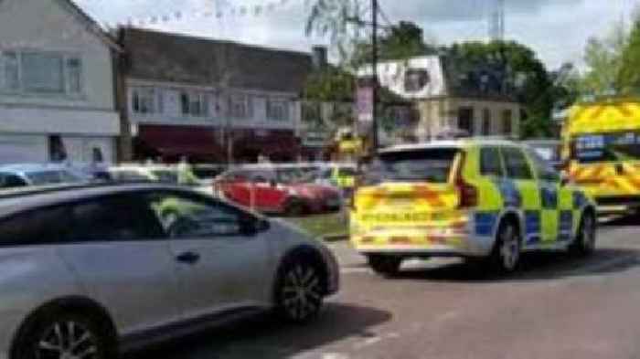 Three injured after vehicle drives into coffee shop