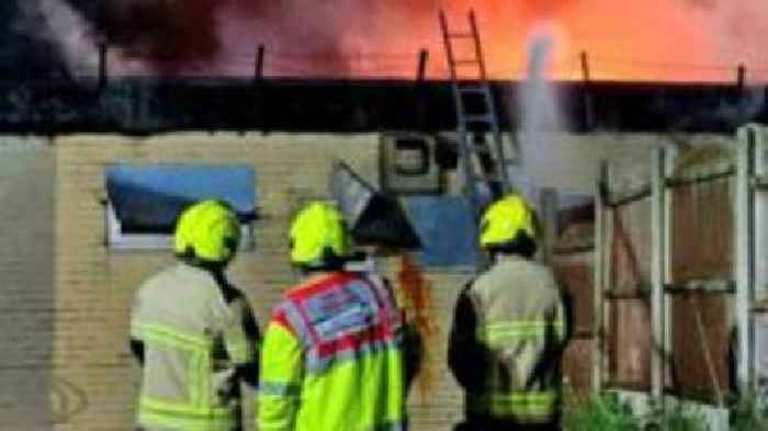 Firefighters tackle derelict social club blaze