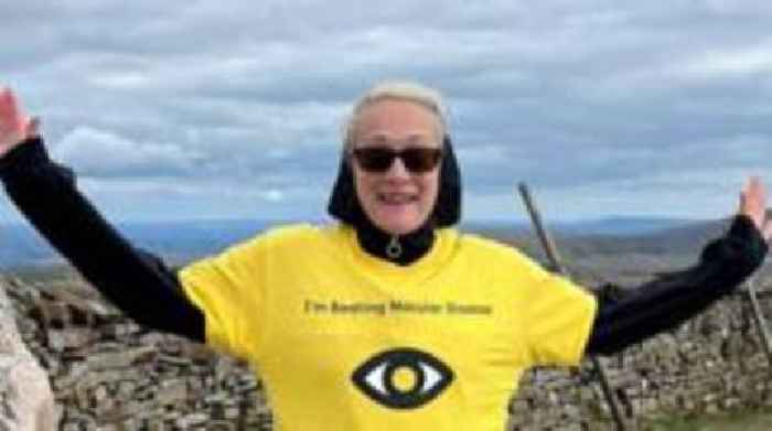 Woman losing sight climbs three mountains