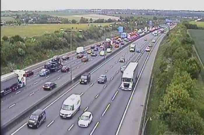 Live M25 traffic updates as 'vehicle with boat trailer' blocks motorway at Wisley
