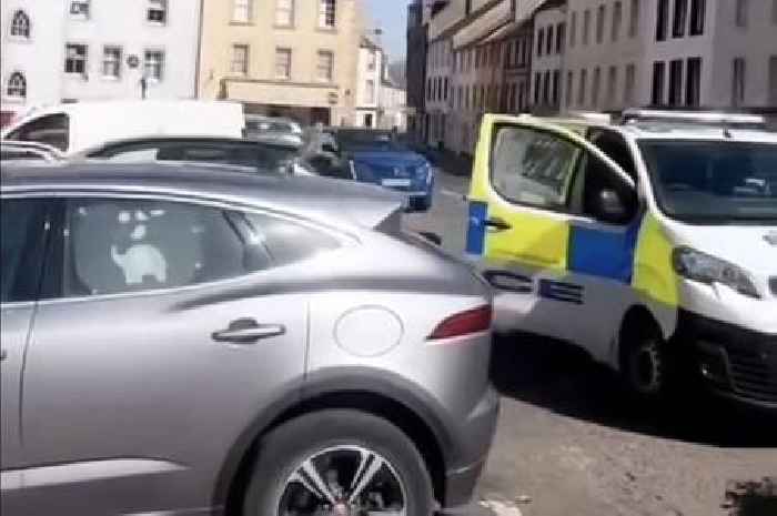 Man charged after car 'knocks down police officer' in Scots town centre
