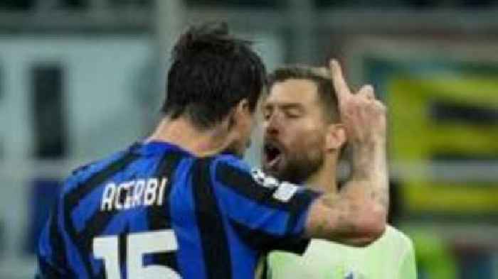 Barcelona's Martinez denies spitting at Acerbi