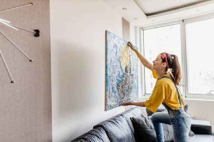 You're hanging pictures wrong – interior designer says mistake makes home look cheap