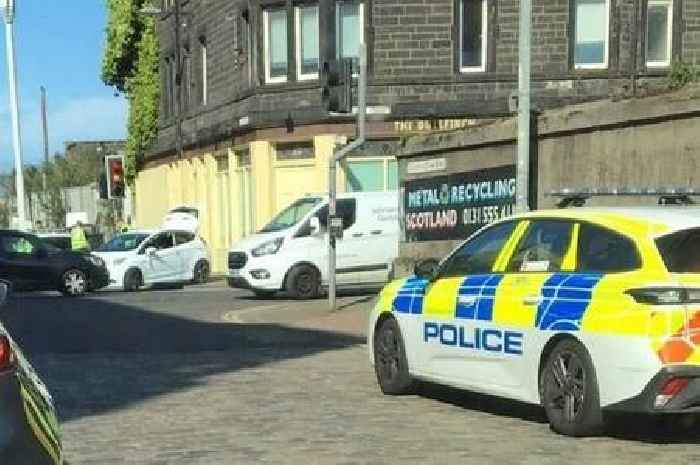 Armed cops lockdown Edinburgh road and arrest man amid 'gangland crackdown'