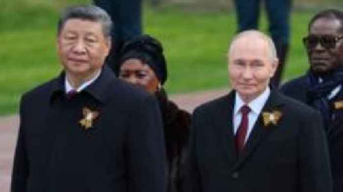 China's Xi stands with Putin at Russia's Victory Day parade