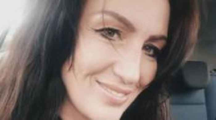 Alleged murder victim found slumped over bed