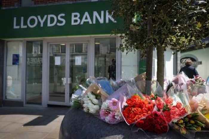 Floral tributes left at Lloyds bank in Derby where 'devoted' man was stabbed to death