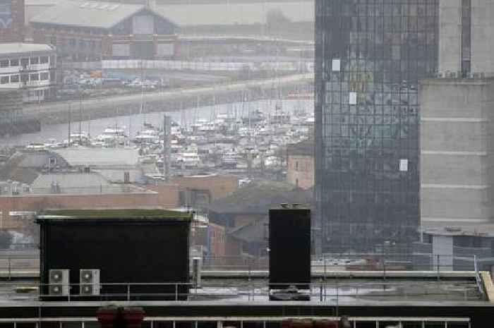 Police search Swansea marina after report of 'human hand' floating in water