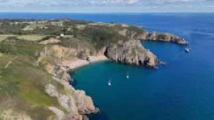 Why was Sark liberated a day after Guernsey?
