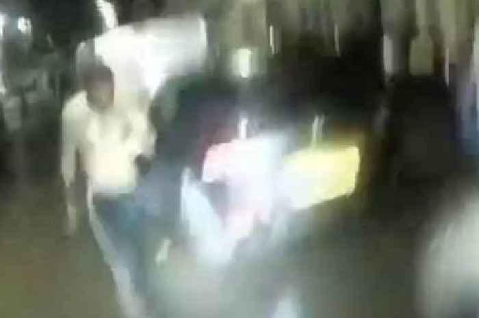 Moment knife thug lunges at cops with blade after biting man's ear off in savage attack