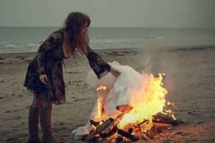Scots singer burns wedding dress on Irvine beach in message to domestic abusers