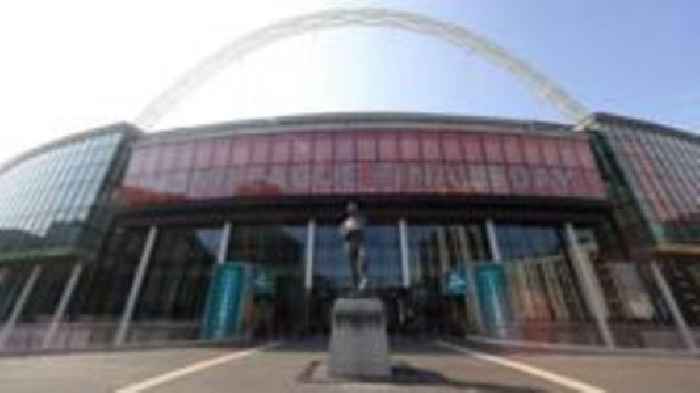 Fans head to Wembley in their thousands for final