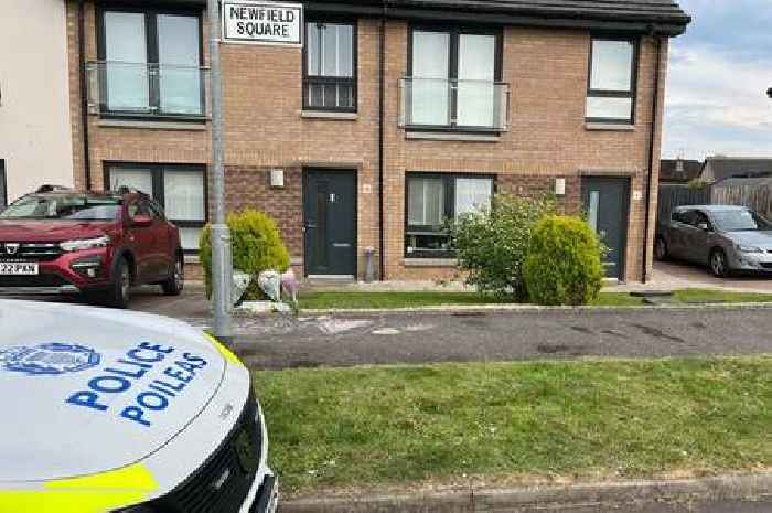 Floral tributes at Glasgow home after death of OAP as police remain at scene