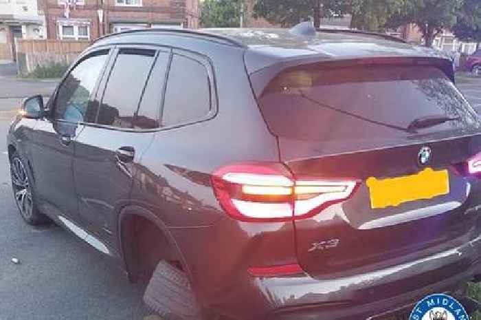 Stolen BMW crashes with car in Birmingham as police hunt runaway driver