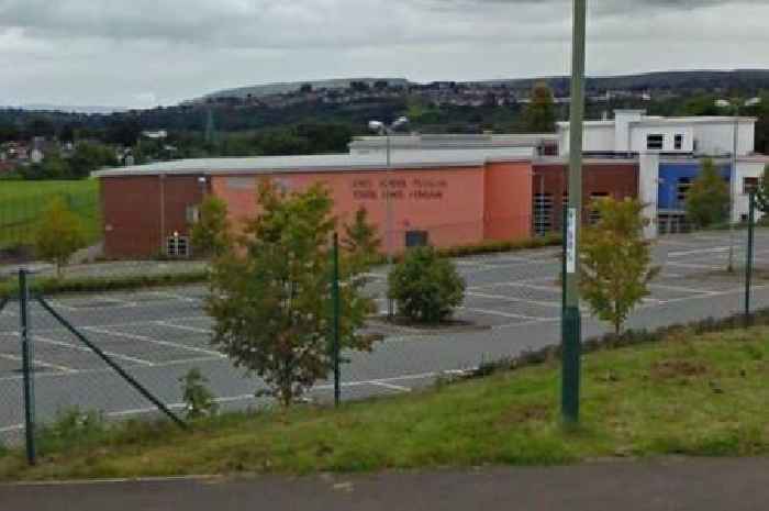 School locked down by armed police amid weapon fears