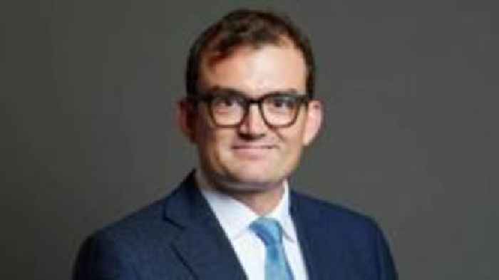 Tory MP charged with two sexual assaults at London's Groucho Club