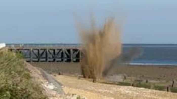 Bomb detonated after person picks it up on beach
