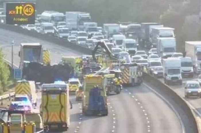 M25 reopens after 12-hour closure as waste lorry overturns in crash