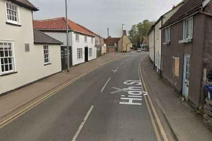 Woman taken to hospital after crash on Cambridgeshire village high street