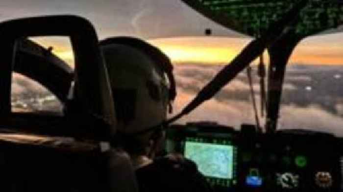 Man held after 'laser shone at police helicopter'