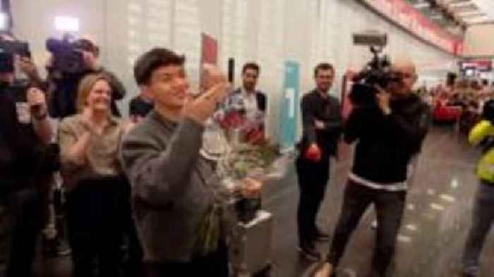 Austrian Eurovision winner JJ receives hero's welcome at Vienna airport